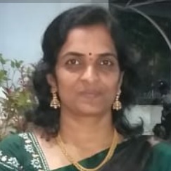 A person smiling for the camera

Description automatically generated